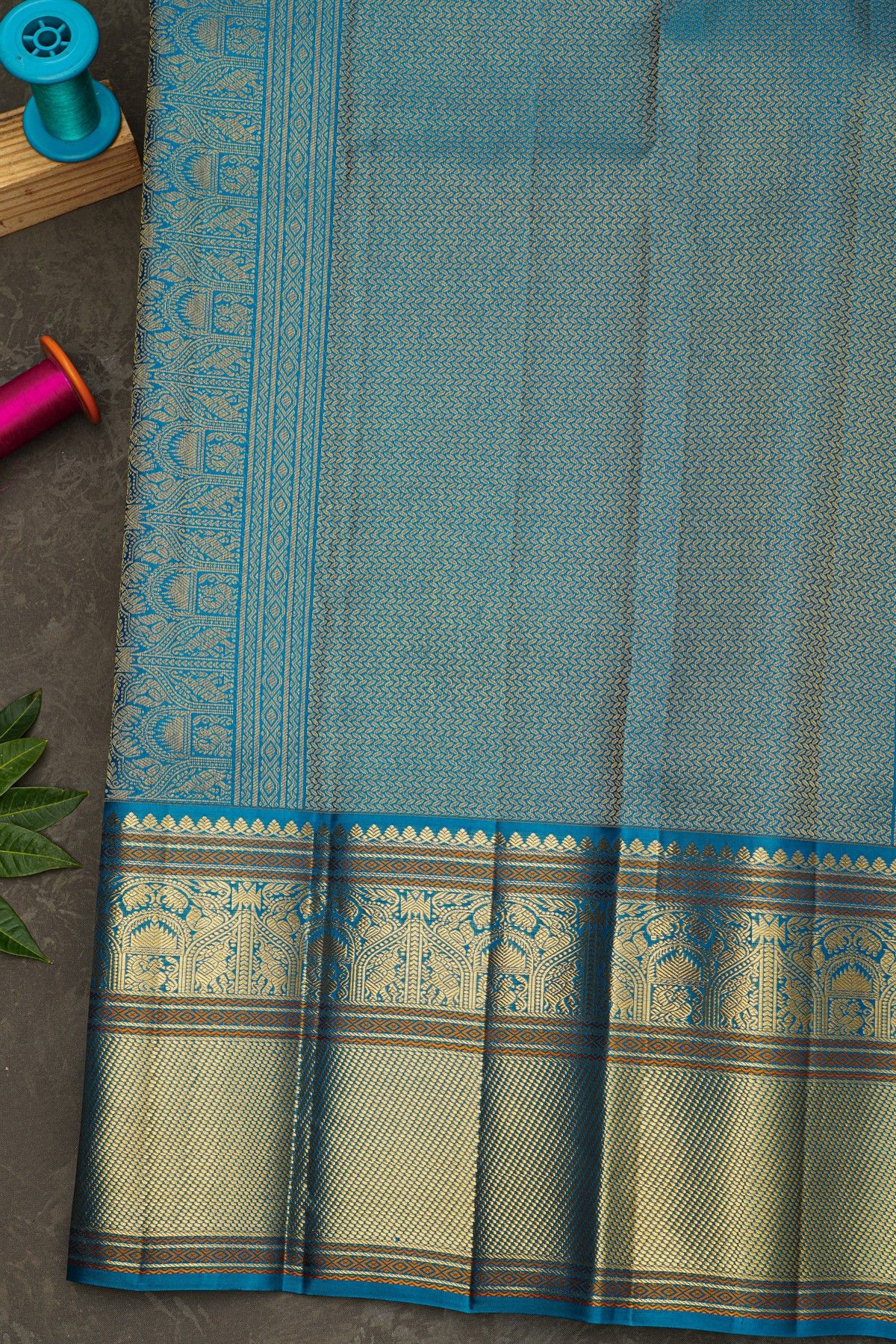 Kancheepuram Silk Rani Pink Saree With Florals And Peacock Buttis Body And Kuttu Border