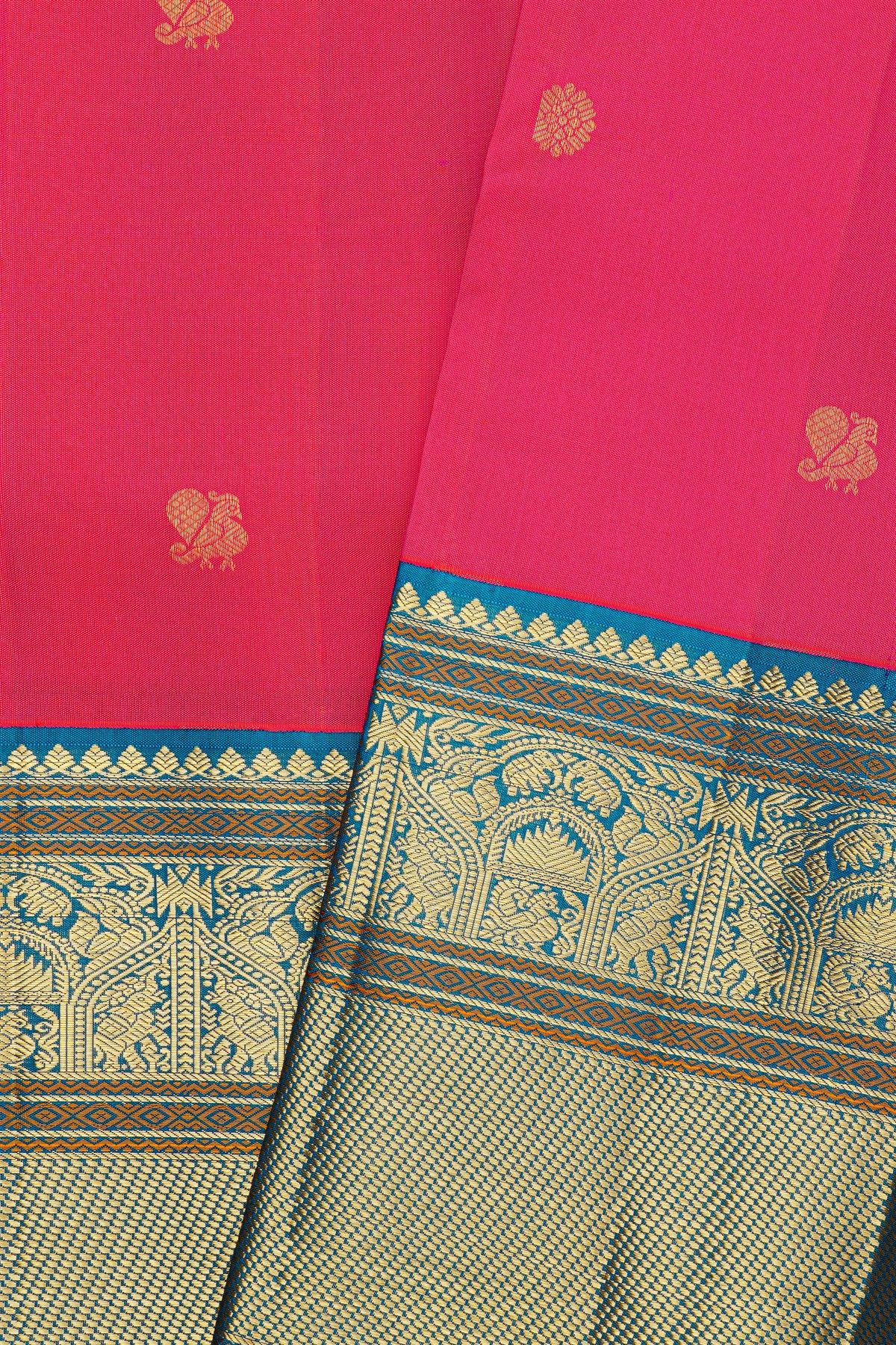 Kancheepuram Silk Rani Pink Saree With Florals And Peacock Buttis Body And Kuttu Border