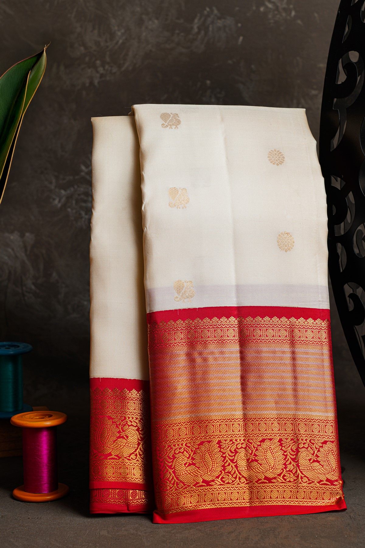 Kancheepuram Silk Off White Saree With Florals And Peacock Buttis Body