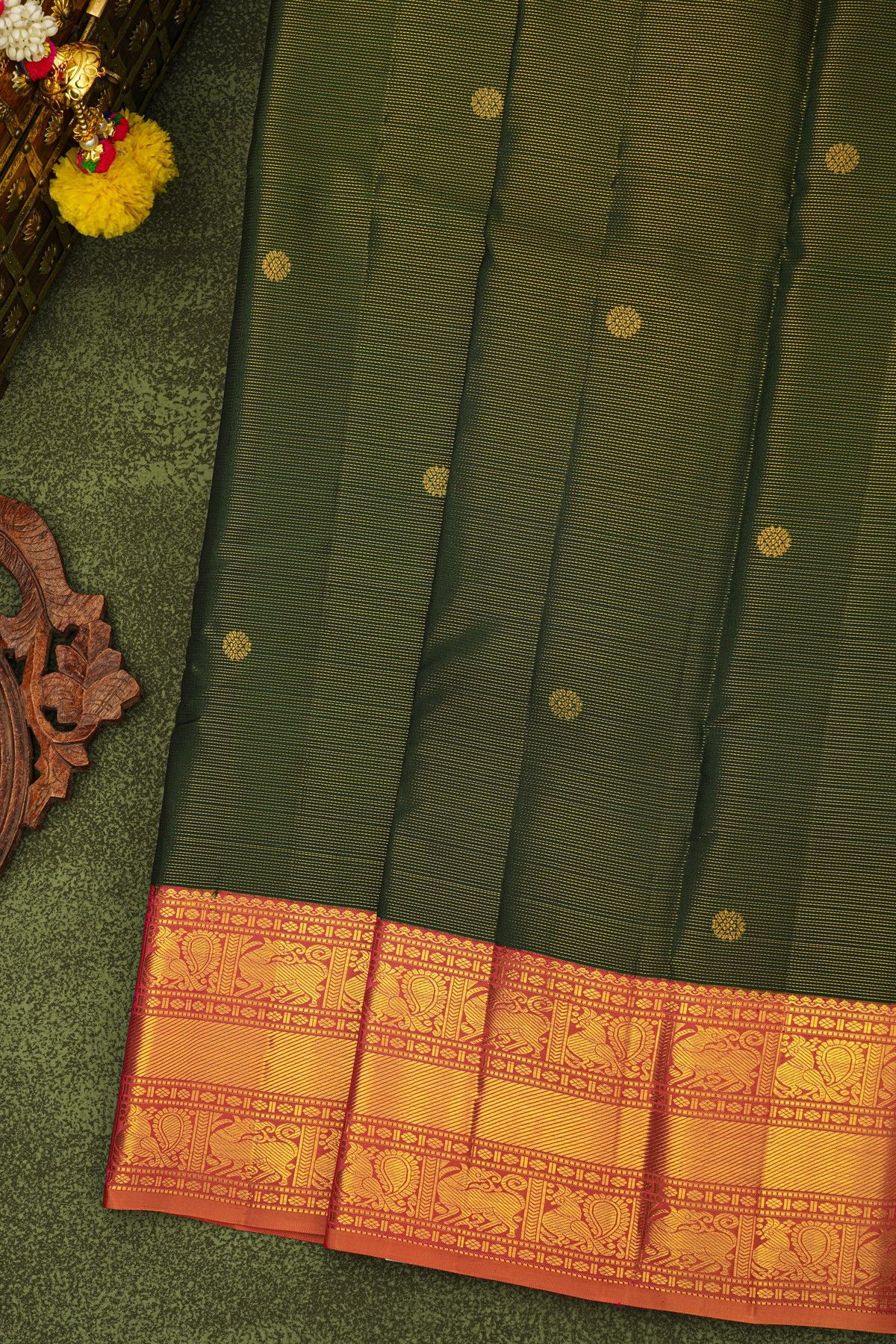 Kancheepuram Silk Bottle Green Saree With Peacocks And Yalis Border
