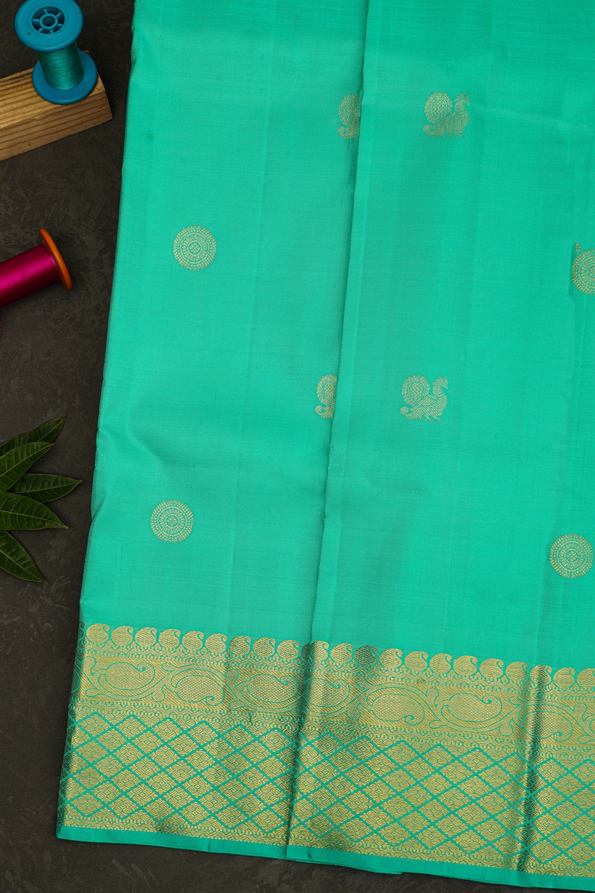 Kancheepuram Silk Sea Green Saree With Florals And Leaves Jaal Border