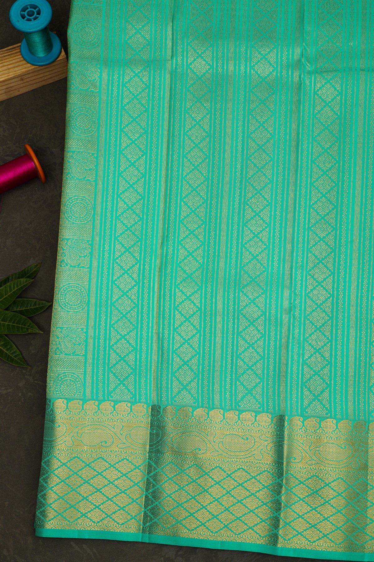 Kancheepuram Silk Sea Green Saree With Florals And Leaves Jaal Border