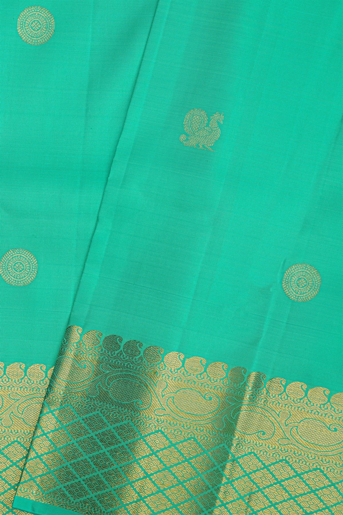 Kancheepuram Silk Sea Green Saree With Florals And Leaves Jaal Border