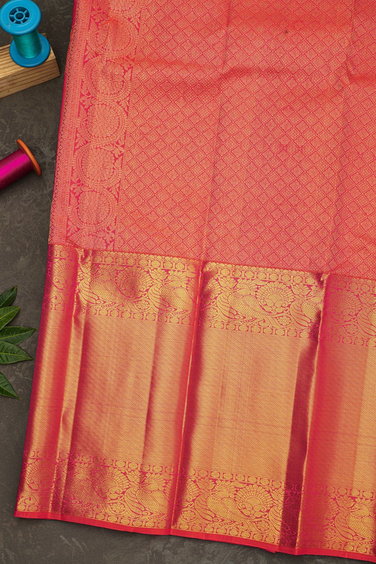 Kancheepuram Silk Pink Saree With Zari Lines And Peacocks Border