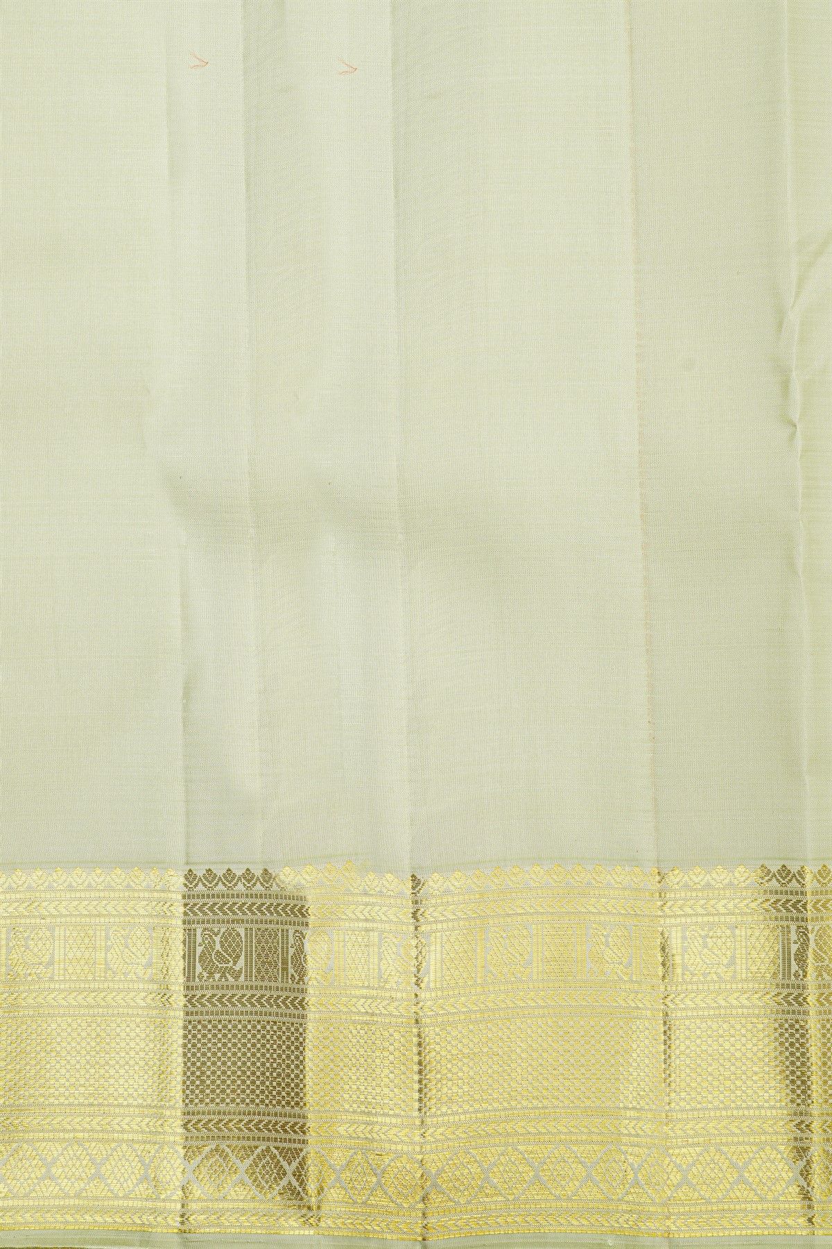 Kancheepuram Silk Off White Saree With Zari Buttis And Peacocks Border