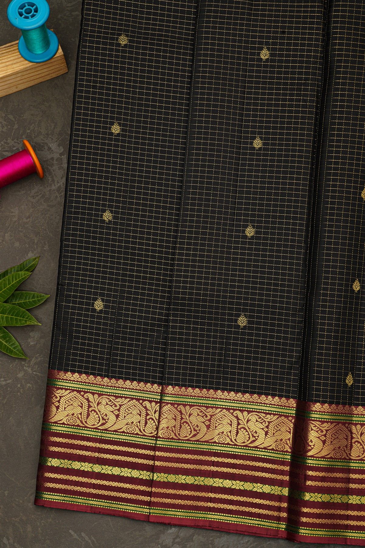Kancheepuram Silk Black Saree With Florals And Buttis In Checks Body