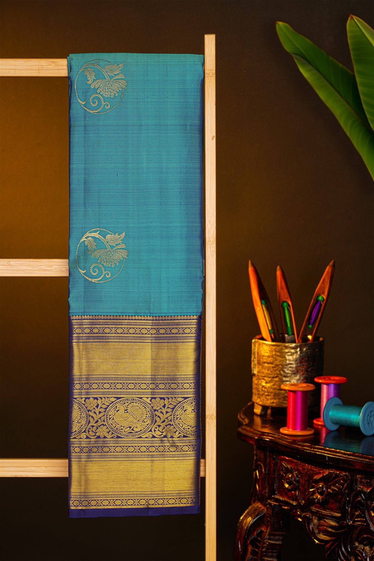 Kancheepuram Silk Blue Saree With Florals And Leaves In Zari Body