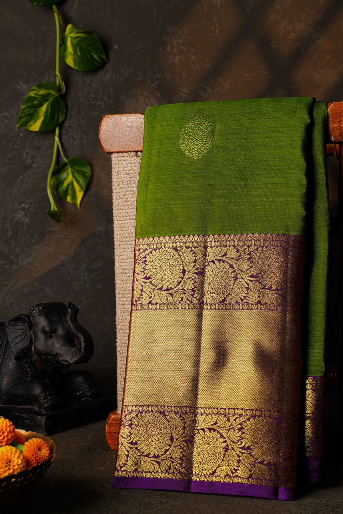 Kancheepuram Silk Mehendi Green Saree With Floral Paisley Buttis Body And Long Border