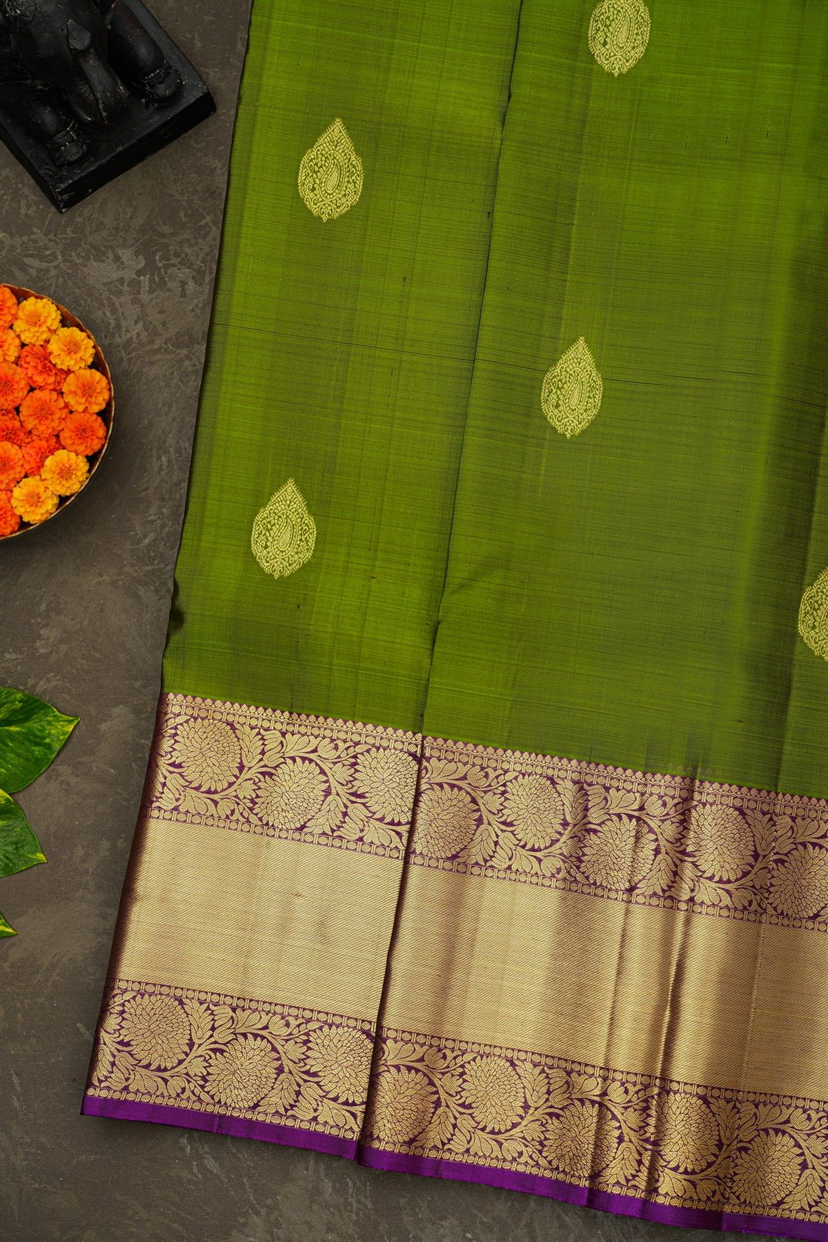 Kancheepuram Silk Mehendi Green Saree With Floral Paisley Buttis Body And Long Border