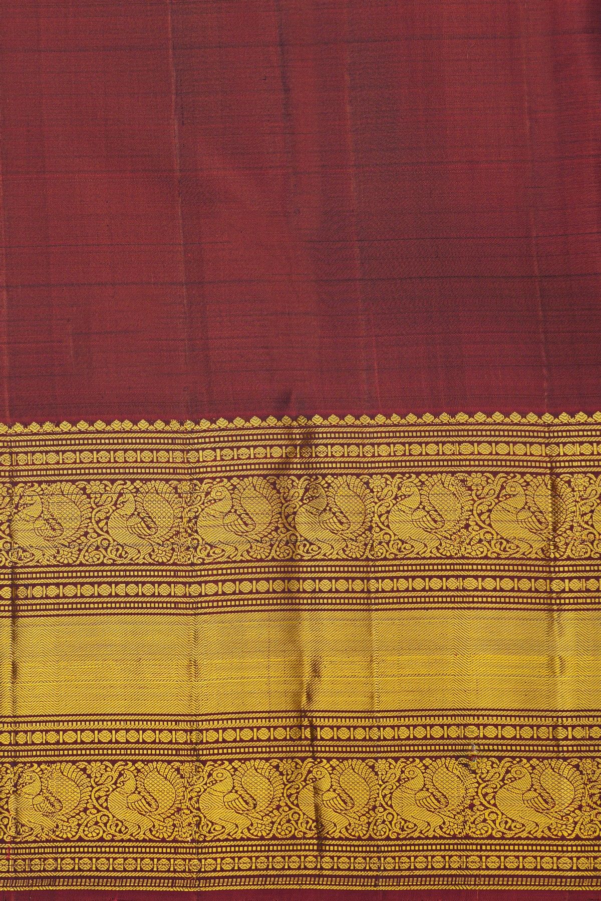 Kancheepuram Silk Wine Saree With Peacock Buttis Body
