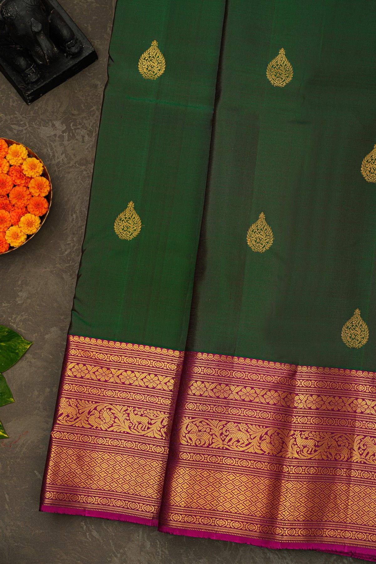 Kancheepuram Silk Bottle Green Saree With Florals And Buttis Body And Long Border