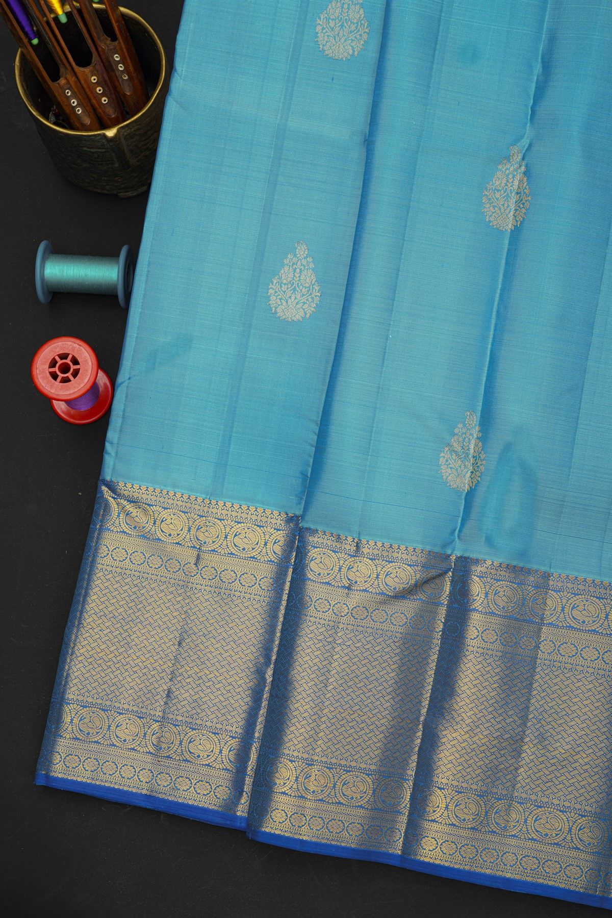 Kancheepuram Silk Sky Blue Saree With Florals And Leaves In Zari Body