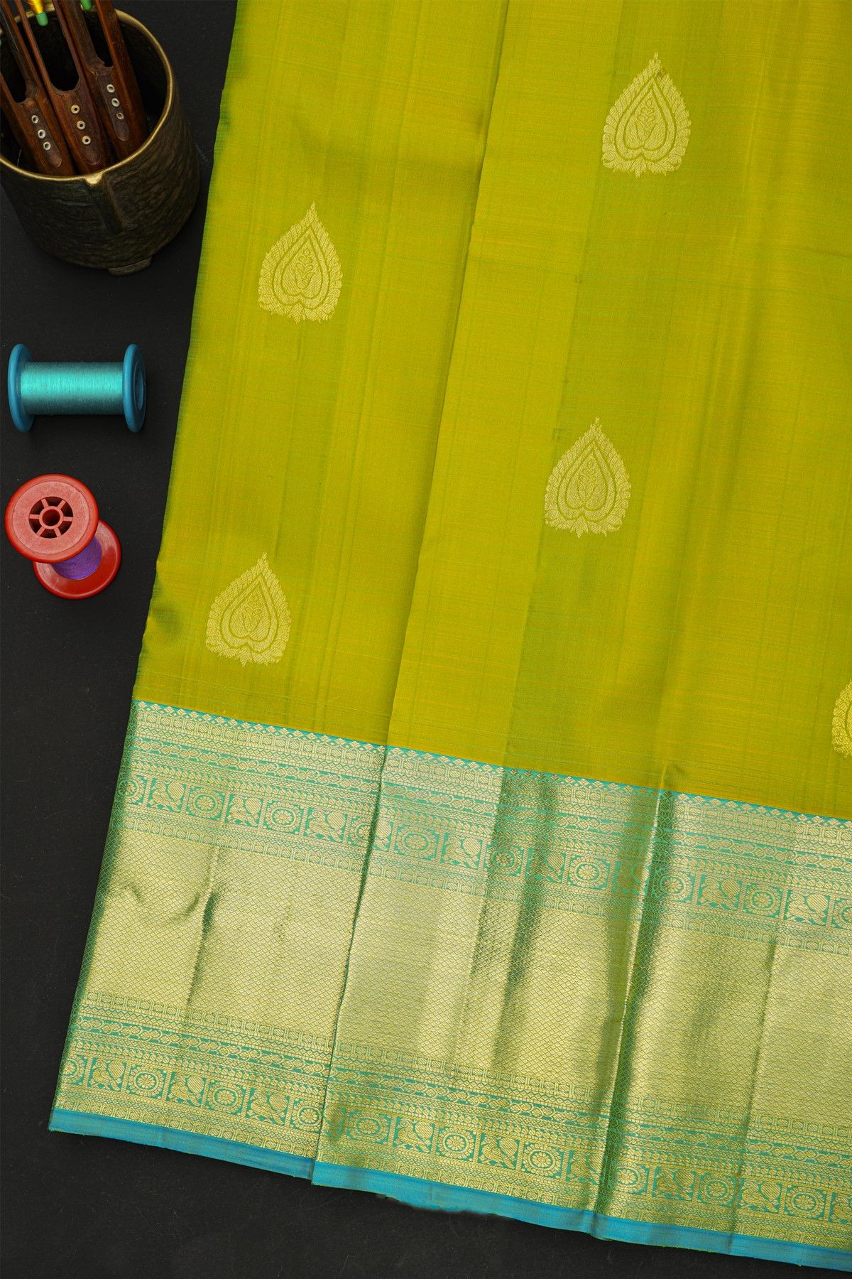 Kancheepuram Silk Green Saree With Florals And Leaves In Zari Body