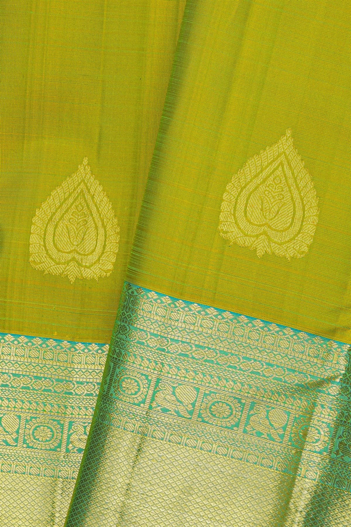 Kancheepuram Silk Green Saree With Florals And Leaves In Zari Body