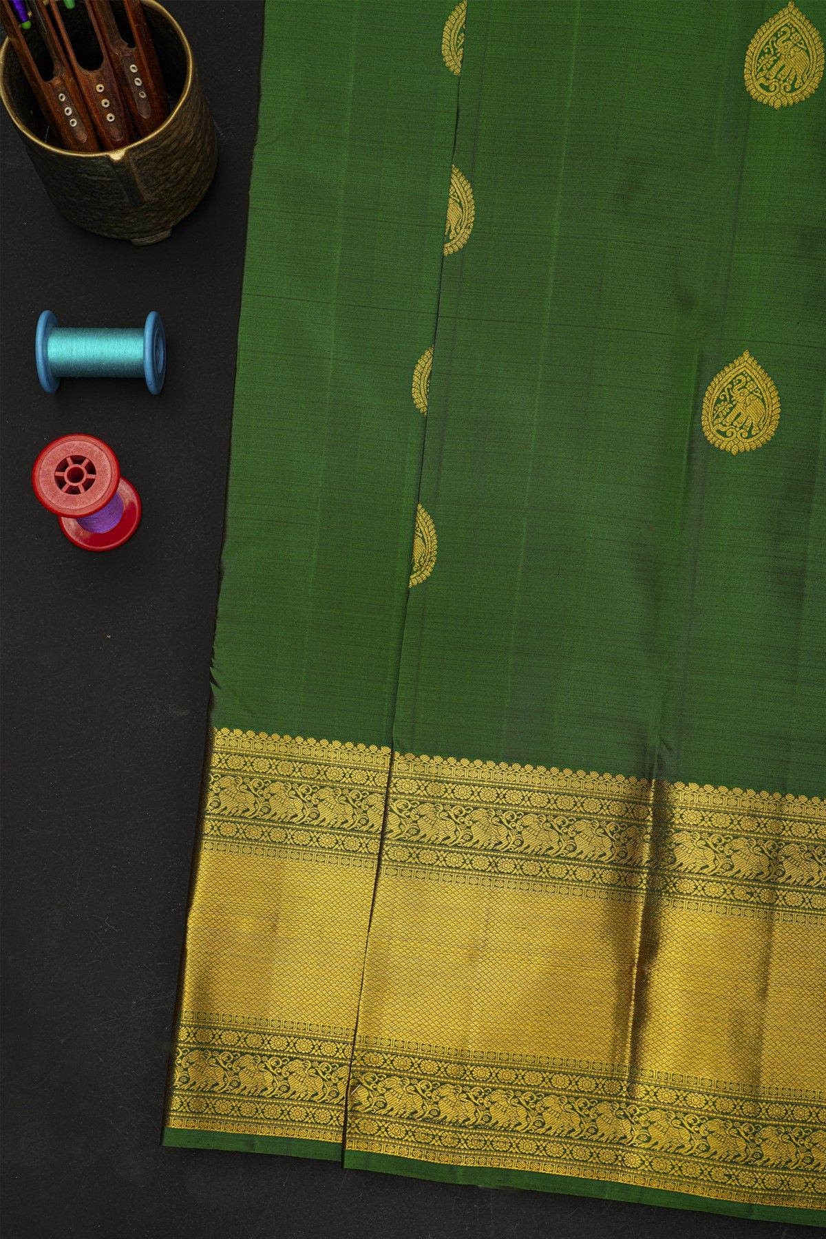 Kancheepuram Silk Bottle Green Saree With Florals And Cross Lines With Yalis Border