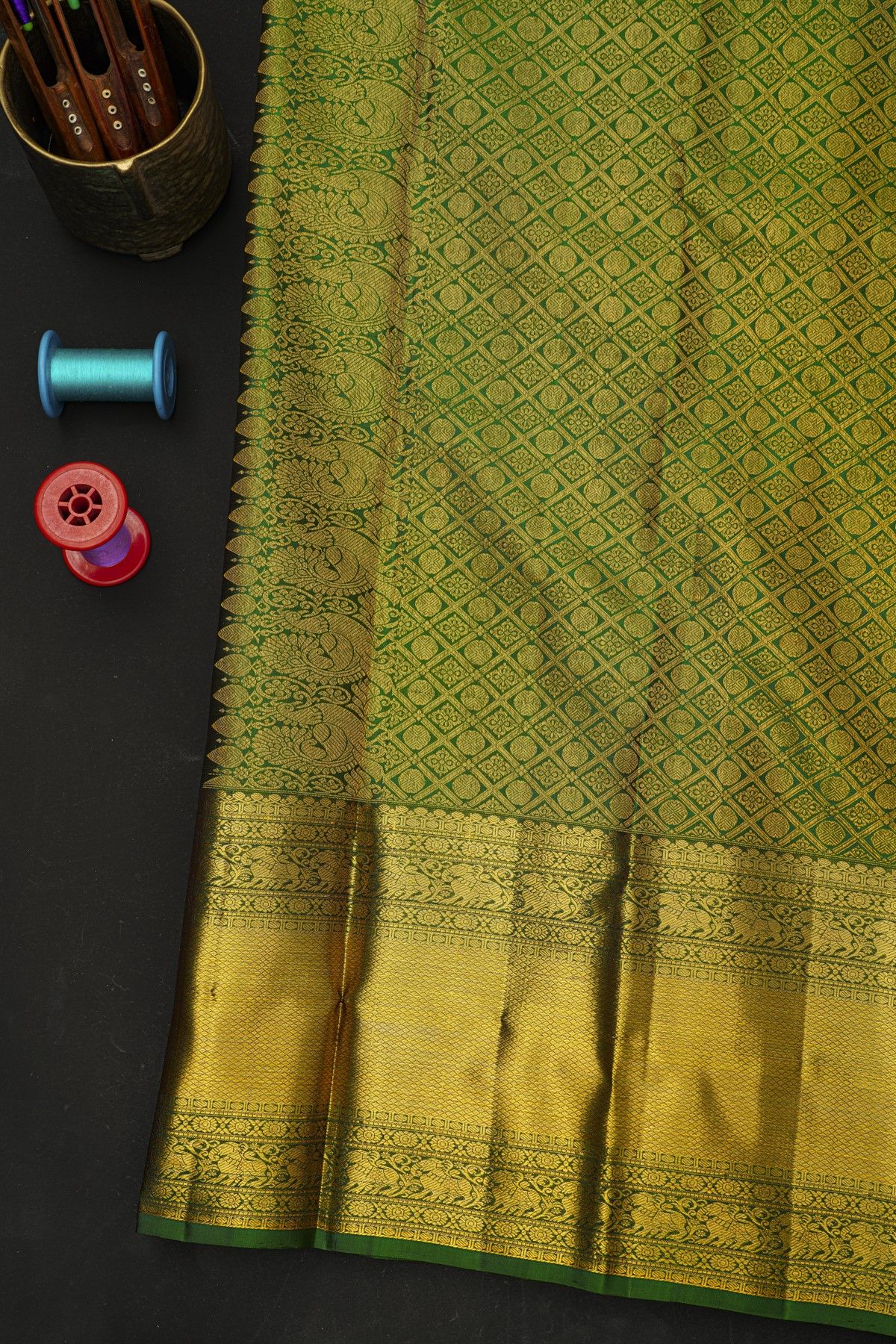 Kancheepuram Silk Bottle Green Saree With Florals And Cross Lines With Yalis Border