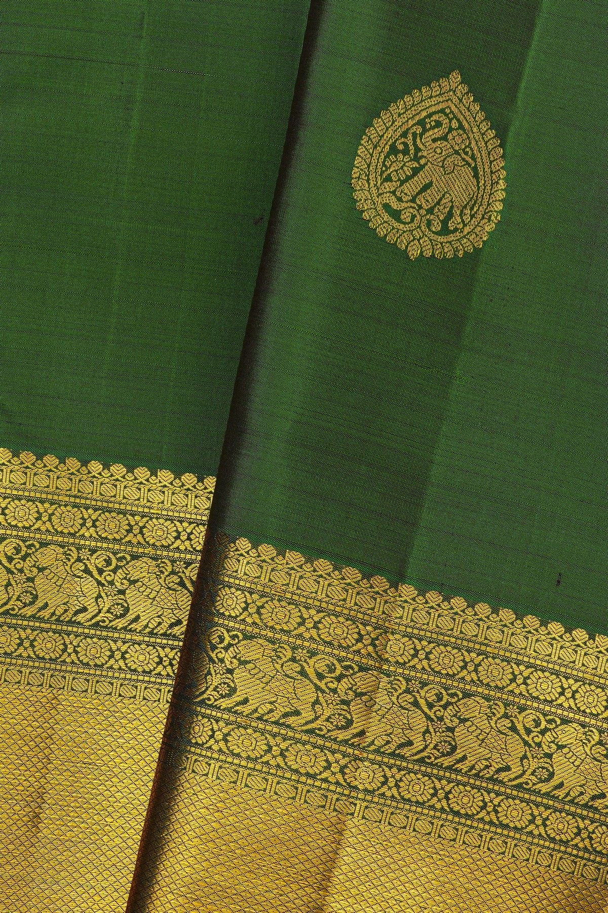 Kancheepuram Silk Bottle Green Saree With Florals And Cross Lines With Yalis Border