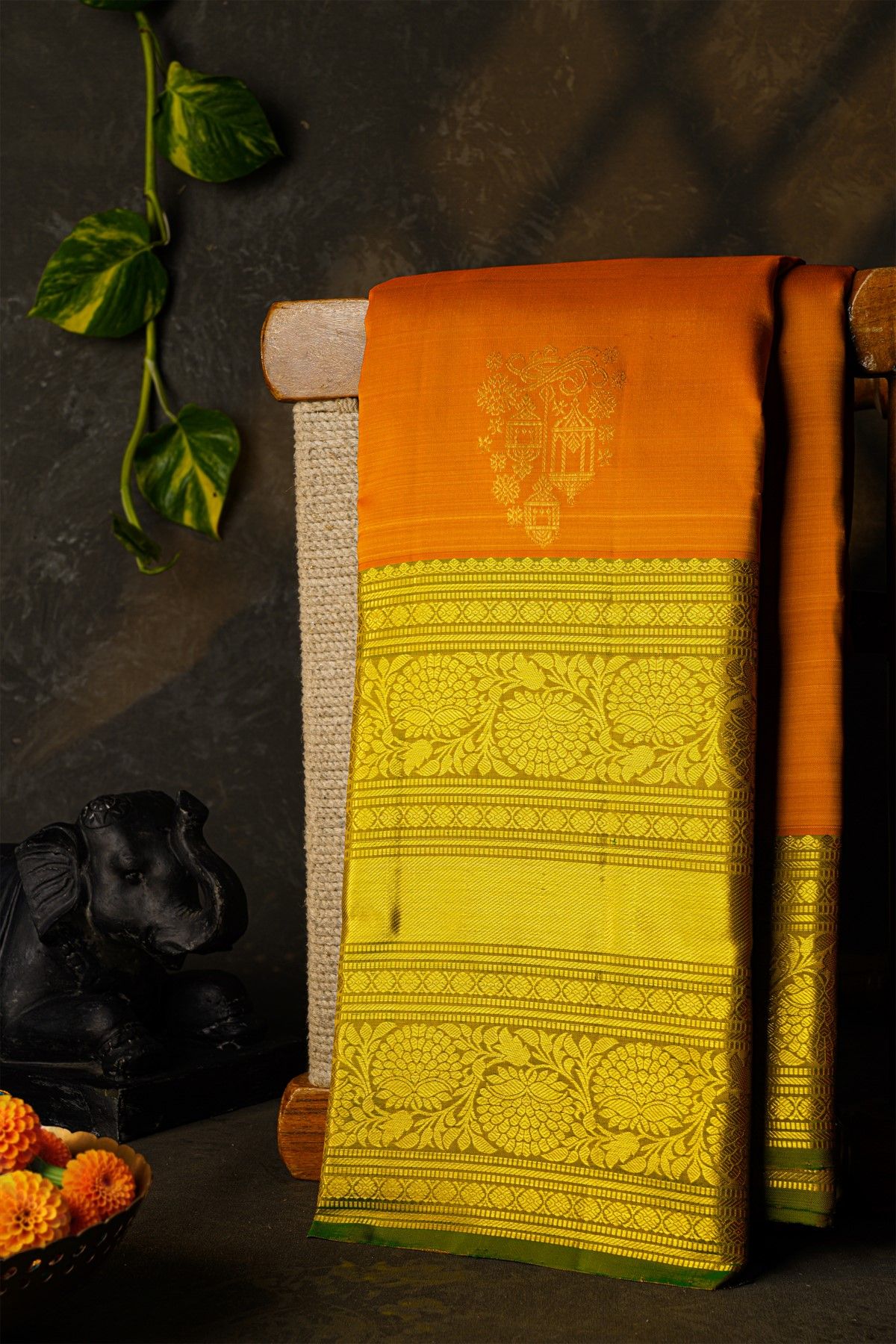 Kancheepuram Silk Orange Saree With Florals And Leaves Jaal Border