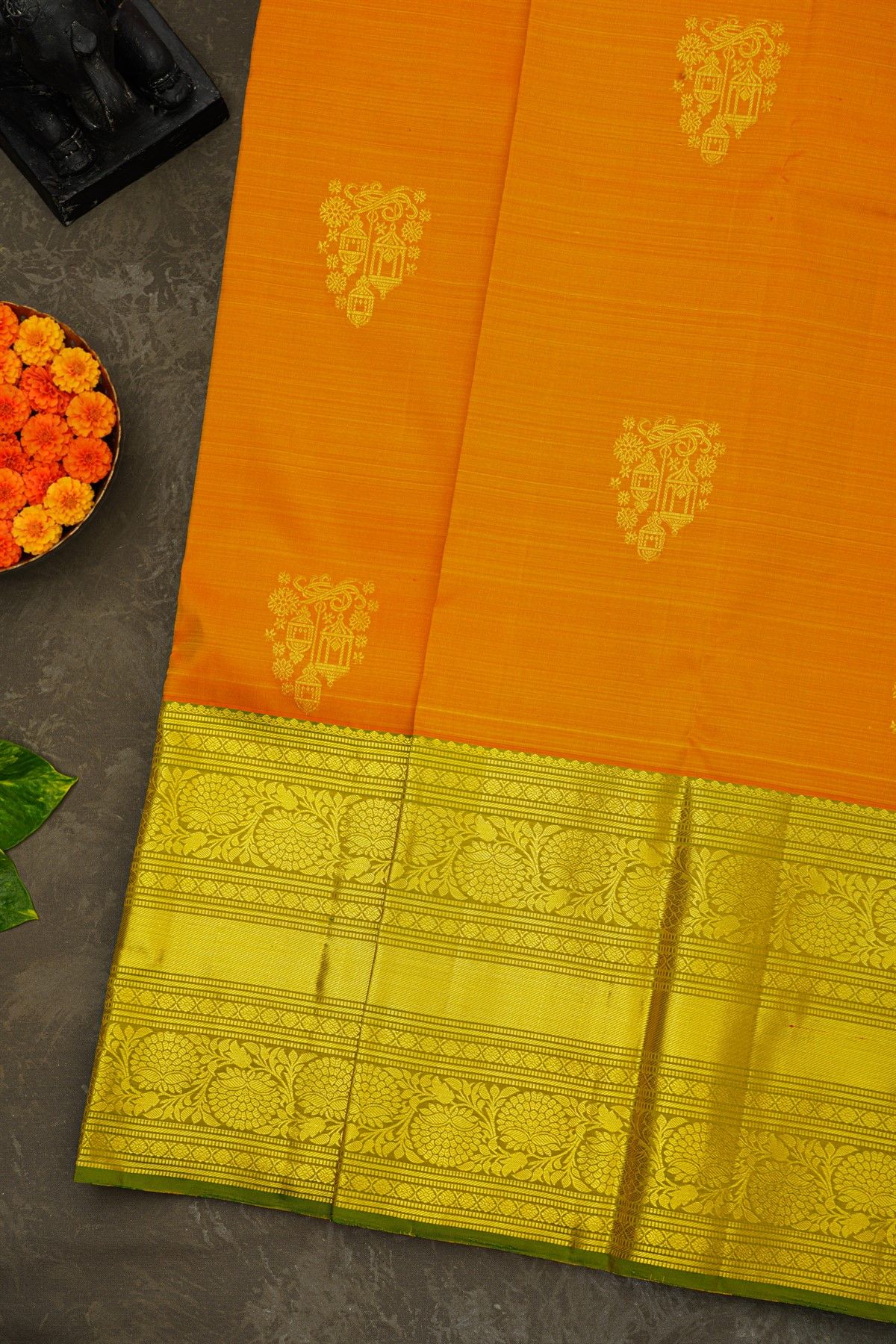 Kancheepuram Silk Orange Saree With Florals And Leaves Jaal Border