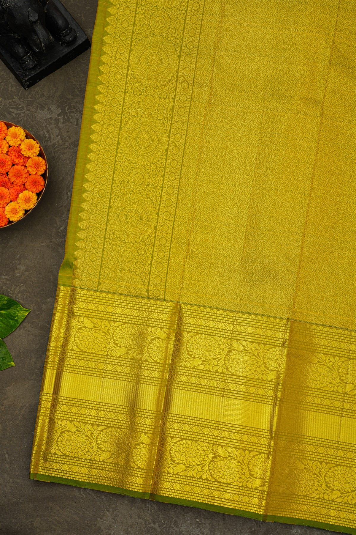 Kancheepuram Silk Orange Saree With Florals And Leaves Jaal Border