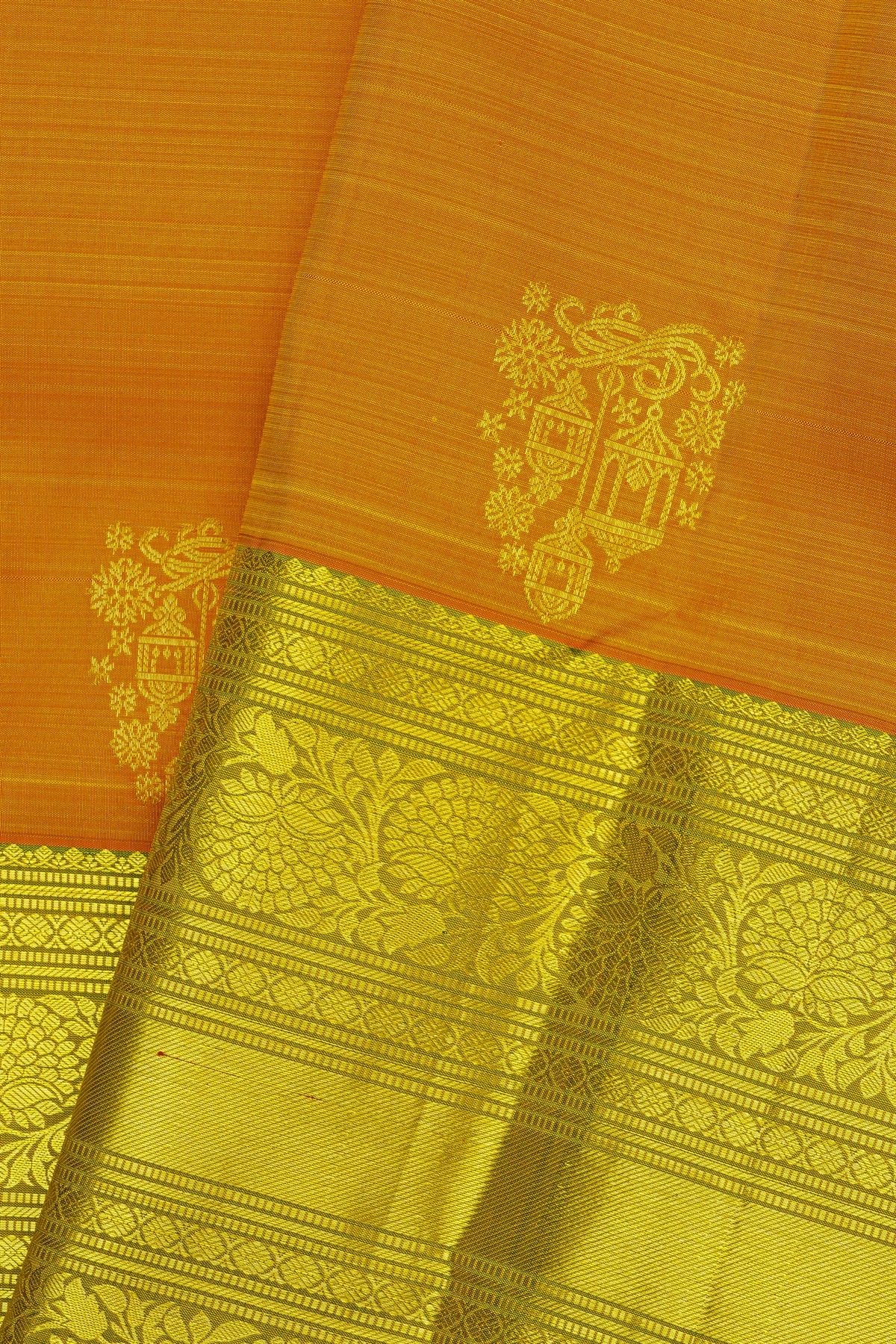 Kancheepuram Silk Orange Saree With Florals And Leaves Jaal Border