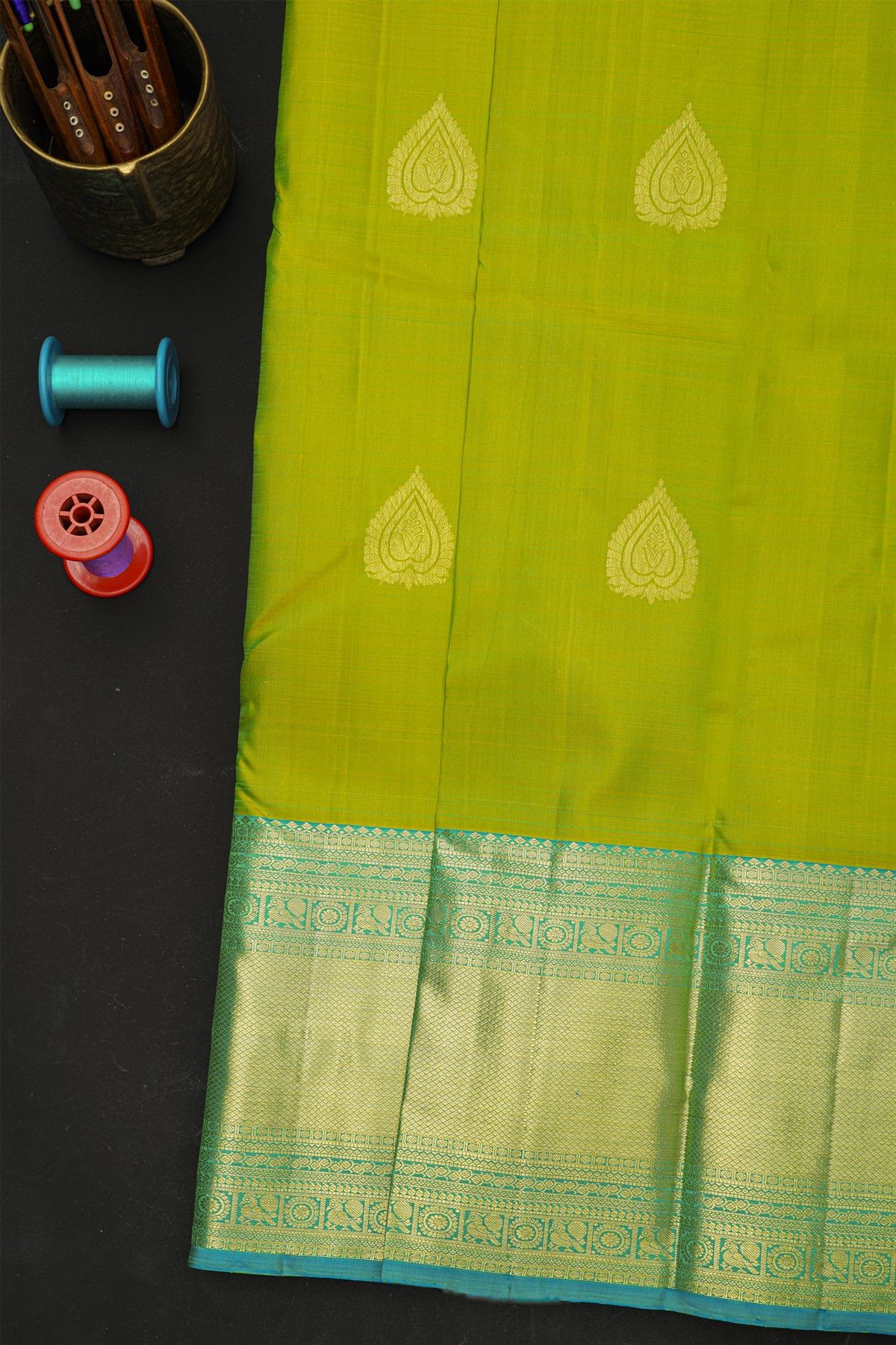 Kancheepuram Silk Green Saree With Florals And Leaves In Zari Body