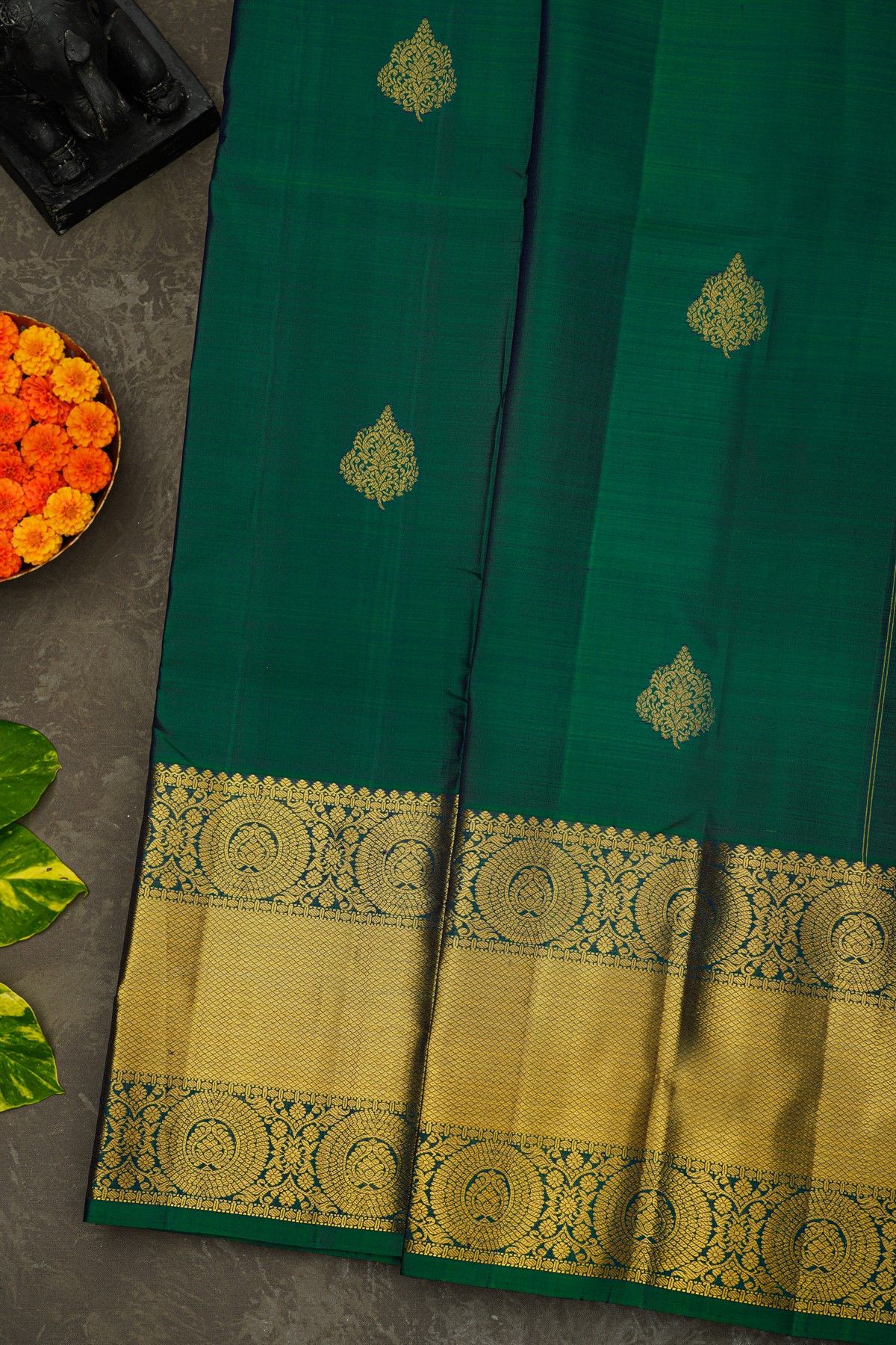Kancheepuram Silk Peacock Green Saree With Florals And Buttis Body
