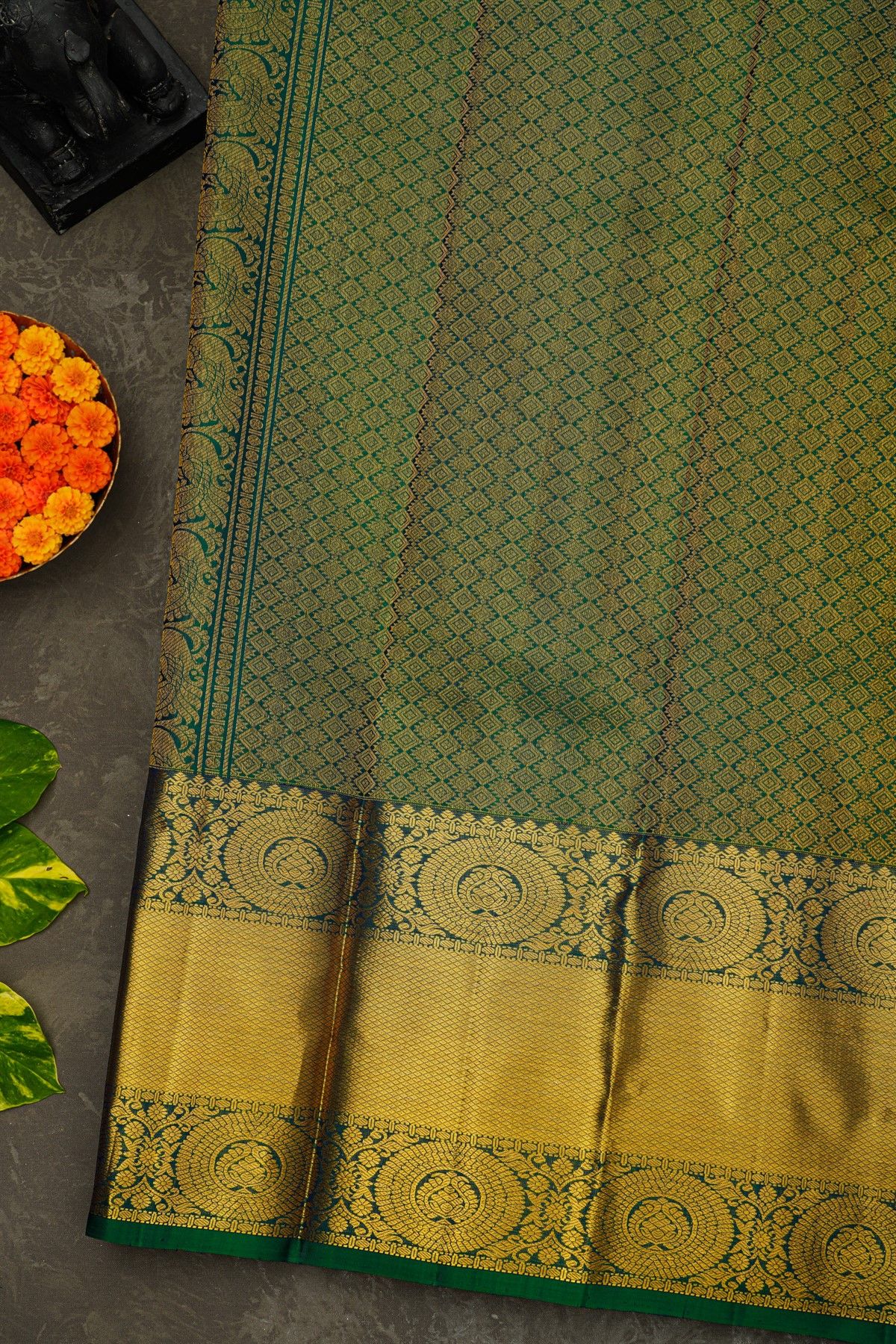 Kancheepuram Silk Peacock Green Saree With Florals And Buttis Body