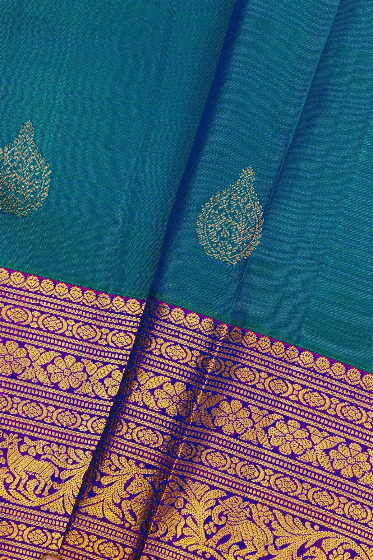 Kancheepuram Silk Blue Saree With Yalis And Peacocks Diamond Border