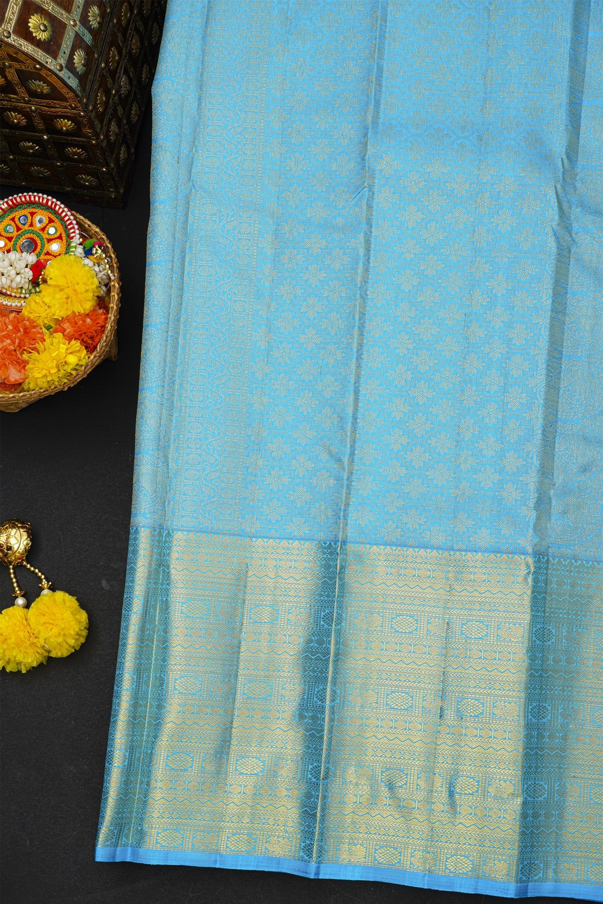 Kancheepuram Silk Sky Blue Saree With Zari Checks Florals And Peacocks Border