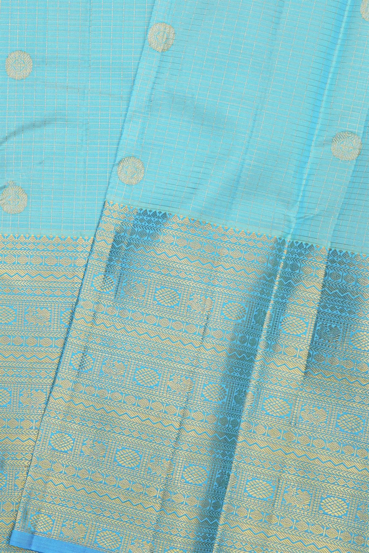 Kancheepuram Silk Sky Blue Saree With Zari Checks Florals And Peacocks Border