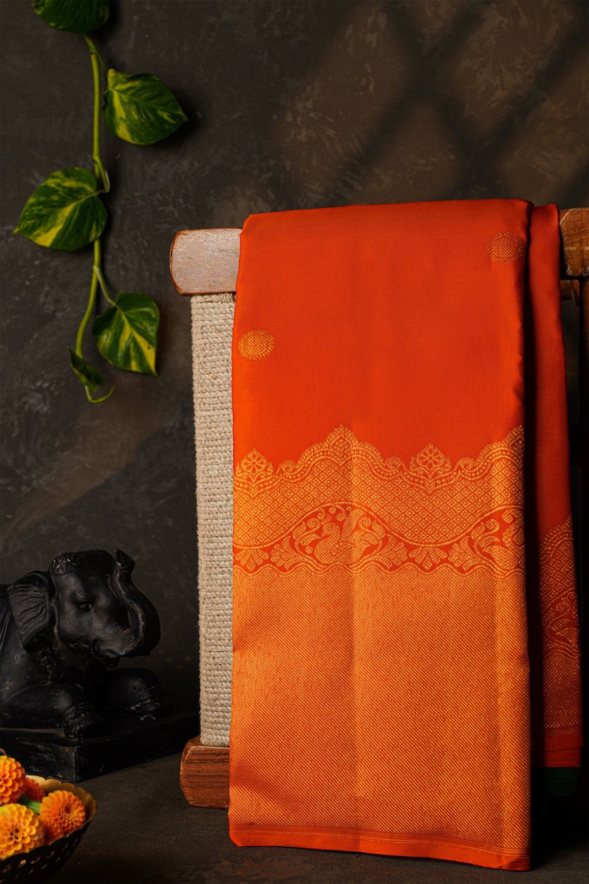 Kancheepuram Silk Orange Saree With Florals And Buttis Body