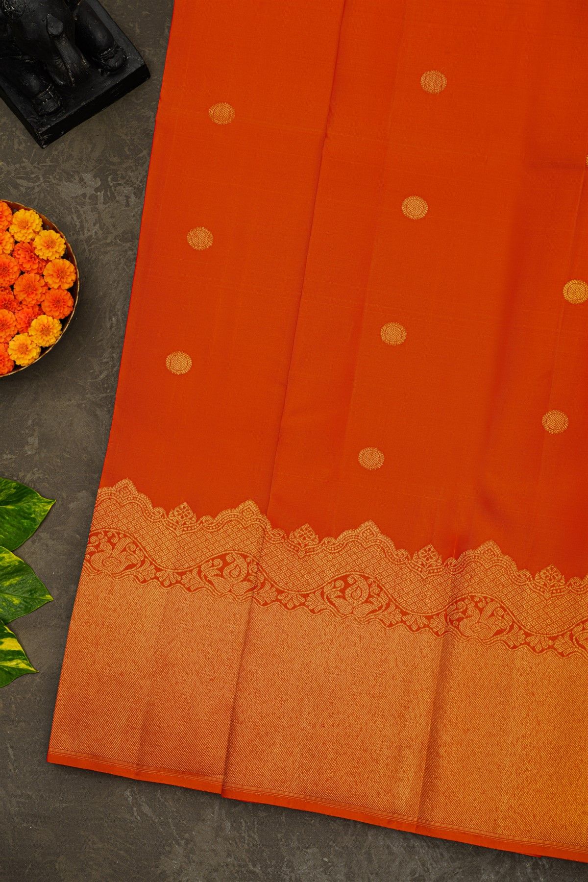 Kancheepuram Silk Orange Saree With Florals And Buttis Body