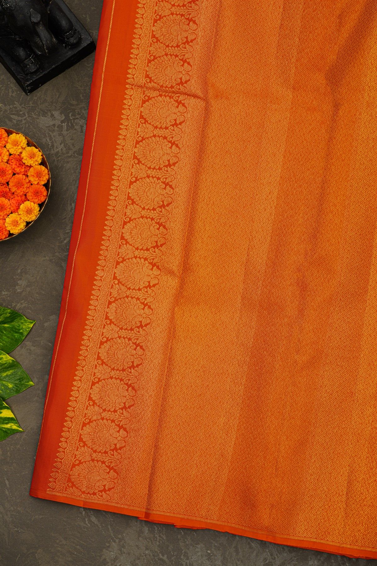 Kancheepuram Silk Orange Saree With Florals And Buttis Body