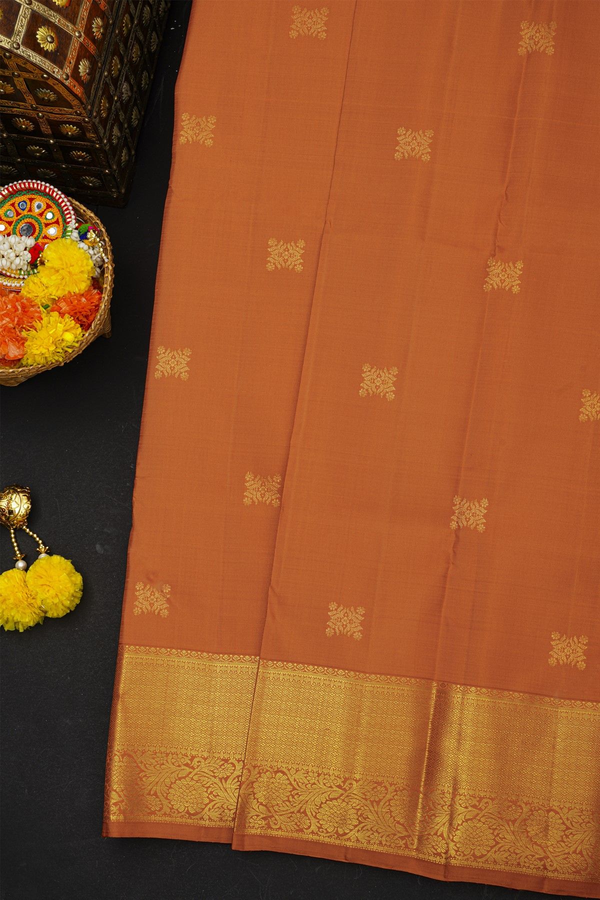 Kancheepuram Silk Rust Saree With Diamonds And Florals Border