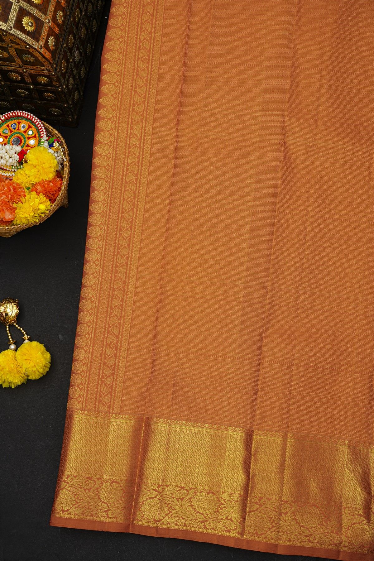 Kancheepuram Silk Rust Saree With Diamonds And Florals Border