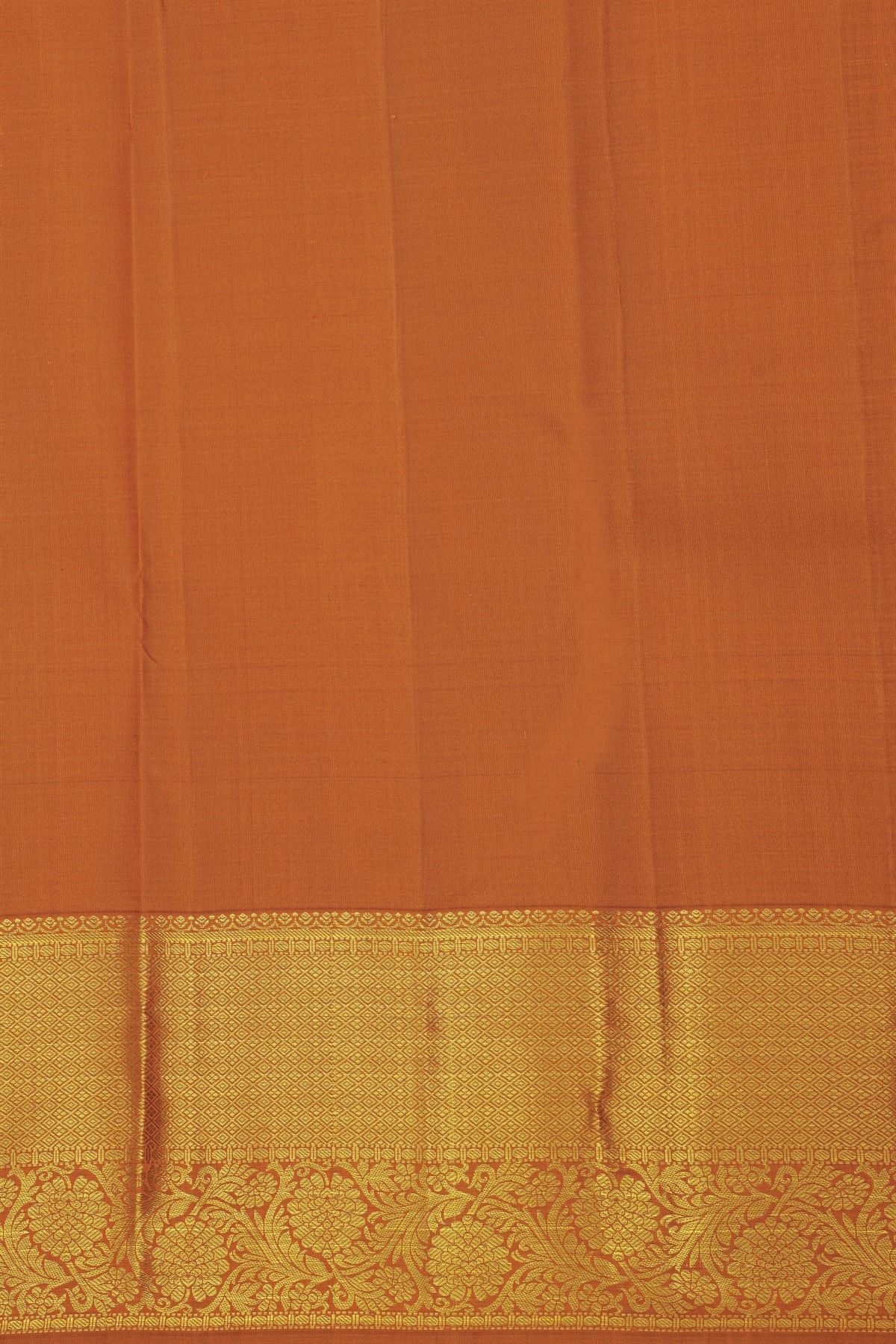 Kancheepuram Silk Rust Saree With Diamonds And Florals Border