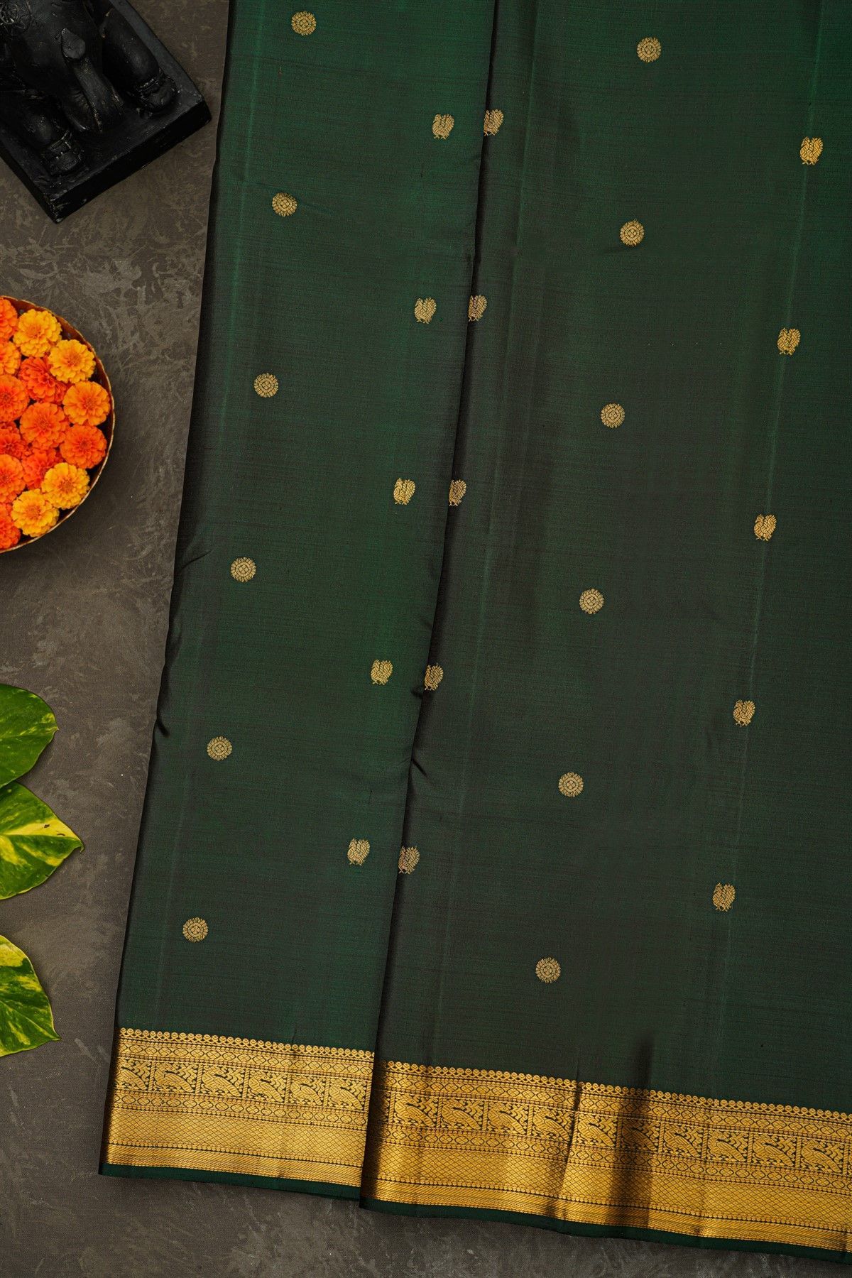 Kancheepuram Silk Forest Green Saree With Florals And Peacock Buttis Body