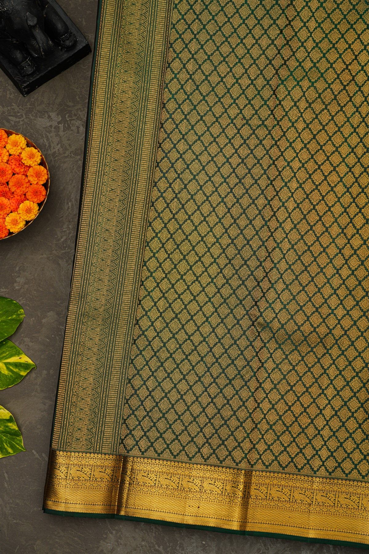 Kancheepuram Silk Forest Green Saree With Florals And Peacock Buttis Body