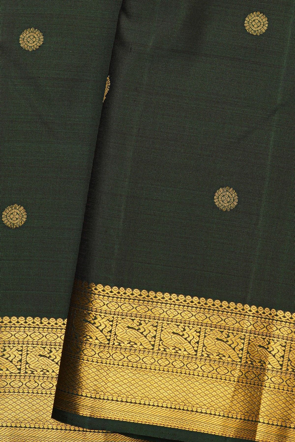Kancheepuram Silk Forest Green Saree With Florals And Peacock Buttis Body