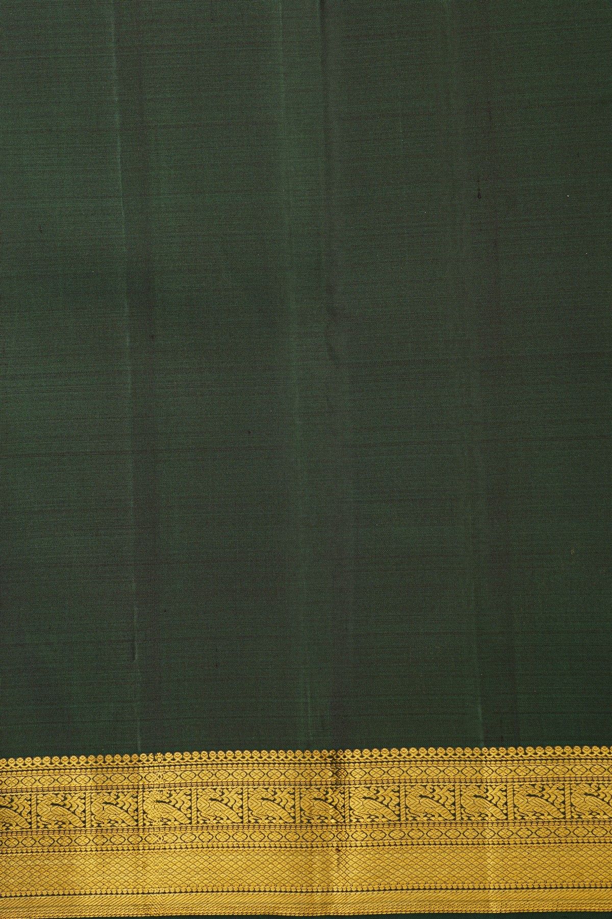 Kancheepuram Silk Forest Green Saree With Florals And Peacock Buttis Body
