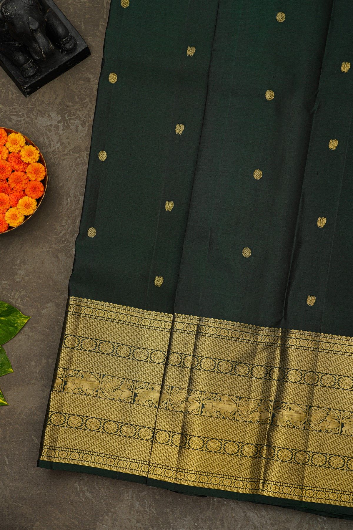 Kancheepuram Silk Dark Green Saree With Florals And Peacock Buttis Body