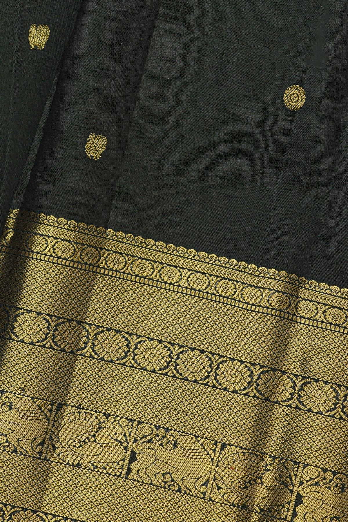 Kancheepuram Silk Dark Green Saree With Florals And Peacock Buttis Body