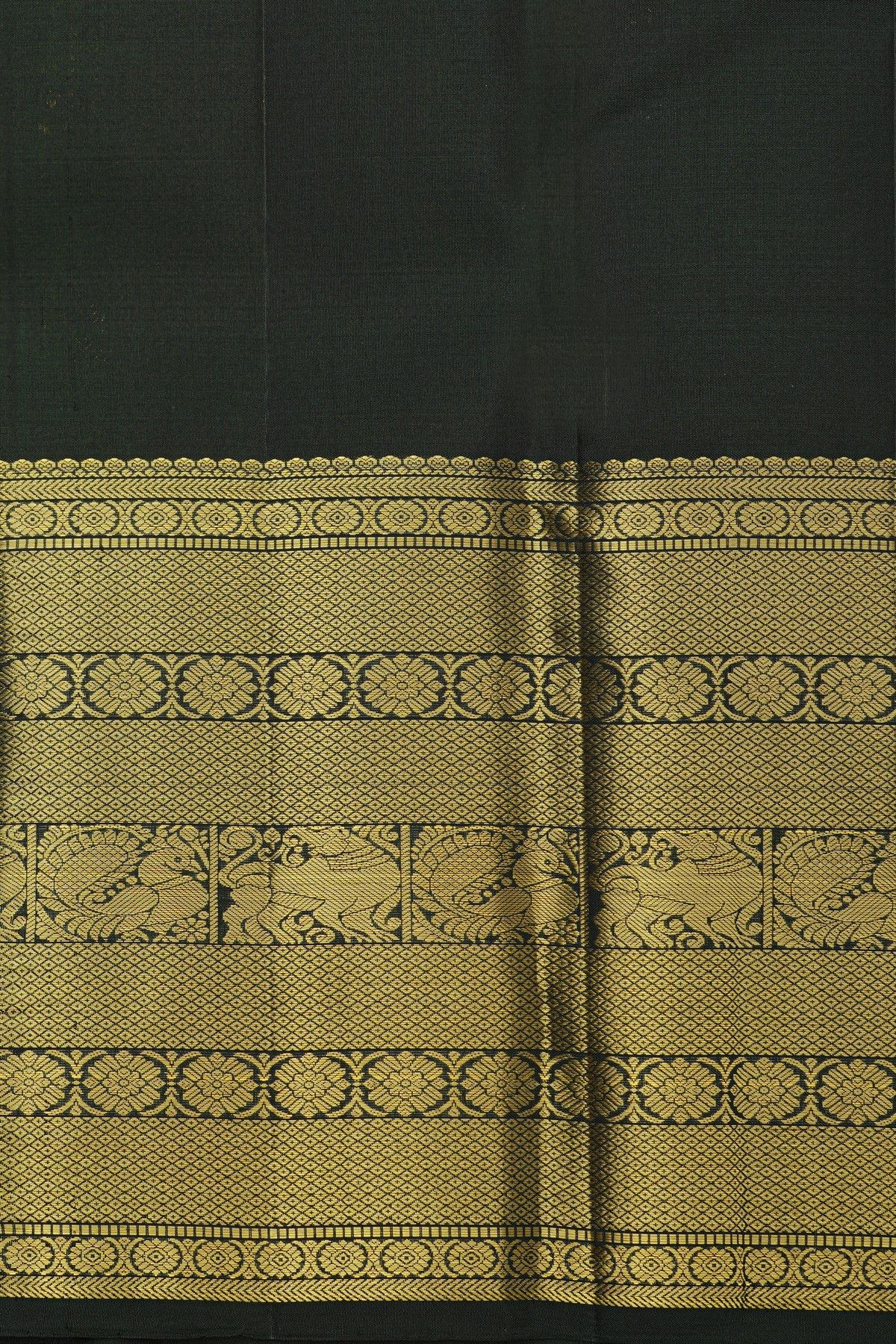 Kancheepuram Silk Dark Green Saree With Florals And Peacock Buttis Body
