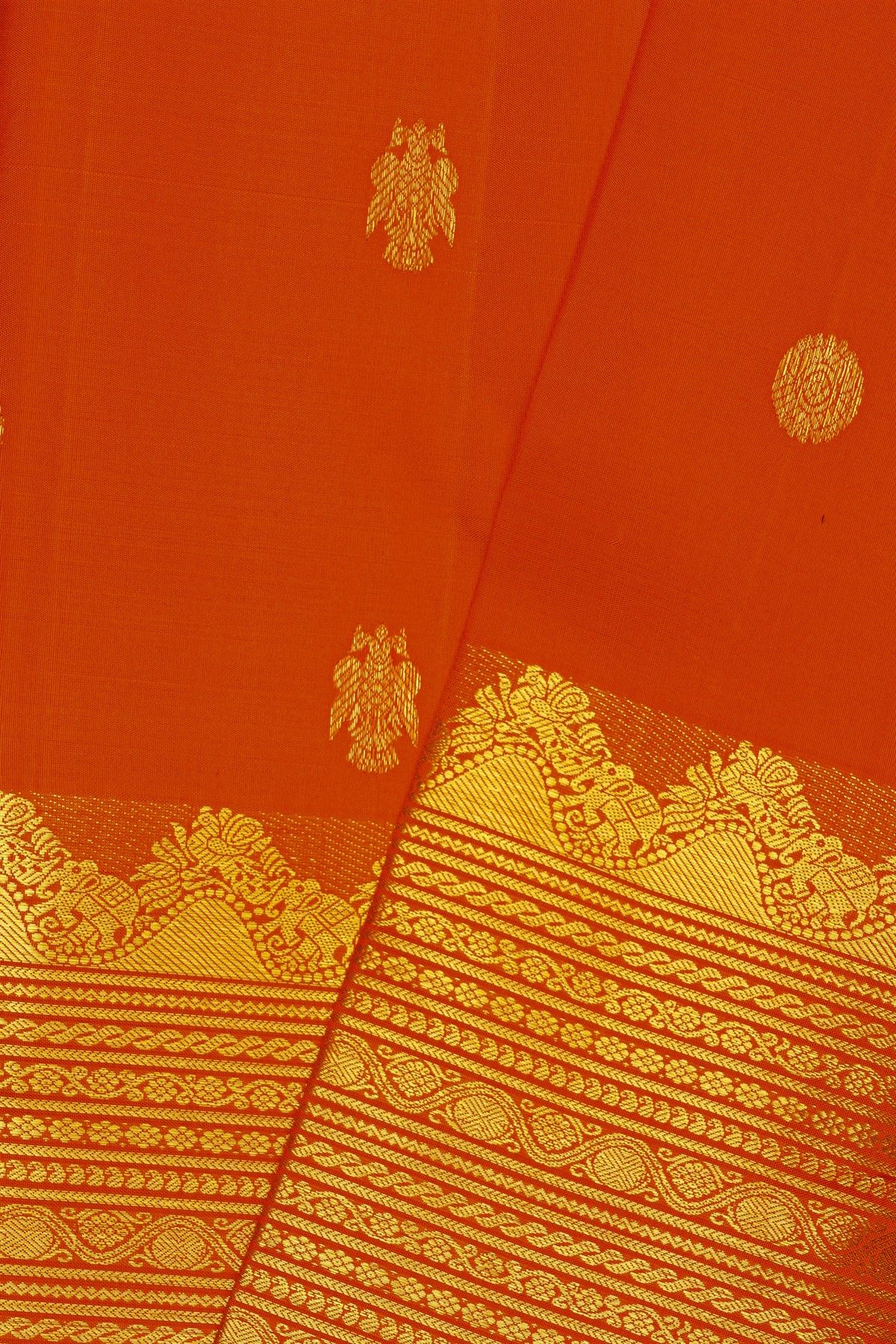 Kancheepuram Silk Orange Saree With Florals And Peacocks In Zari Body
