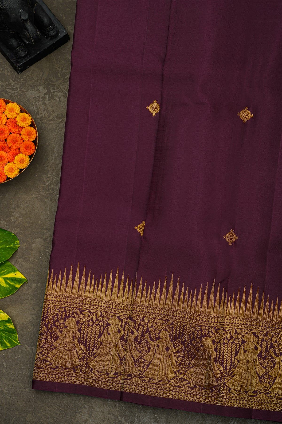 Kancheepuram Silk Wine Saree With Florals Leaves And Women Motifs Border