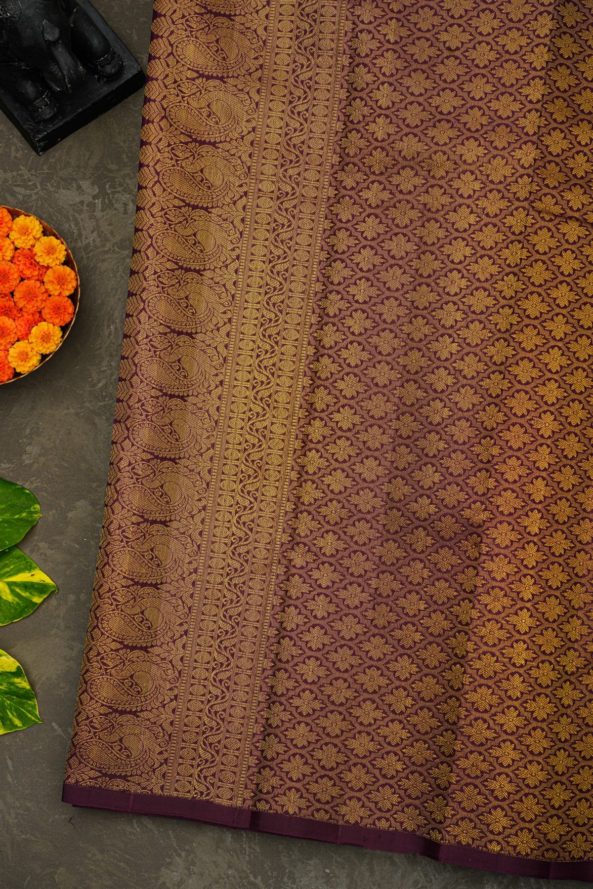 Kancheepuram Silk Wine Saree With Florals Leaves And Women Motifs Border