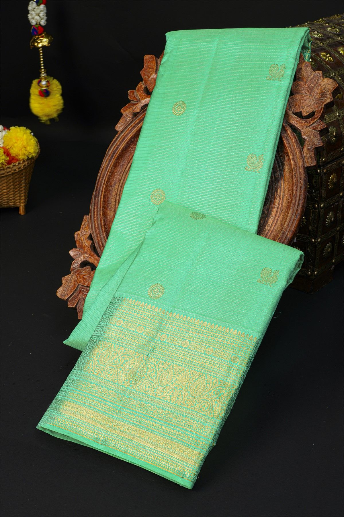 Kancheepuram Silk Sea Green Saree With Florals And Peacock Buttis Body
