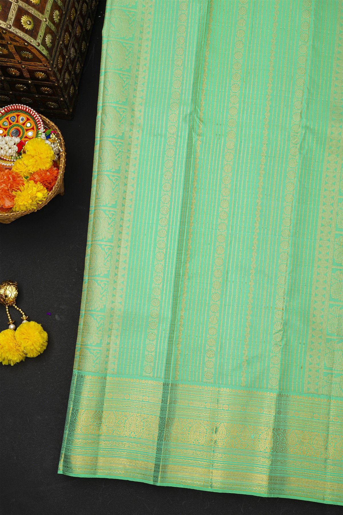 Kancheepuram Silk Sea Green Saree With Florals And Peacock Buttis Body