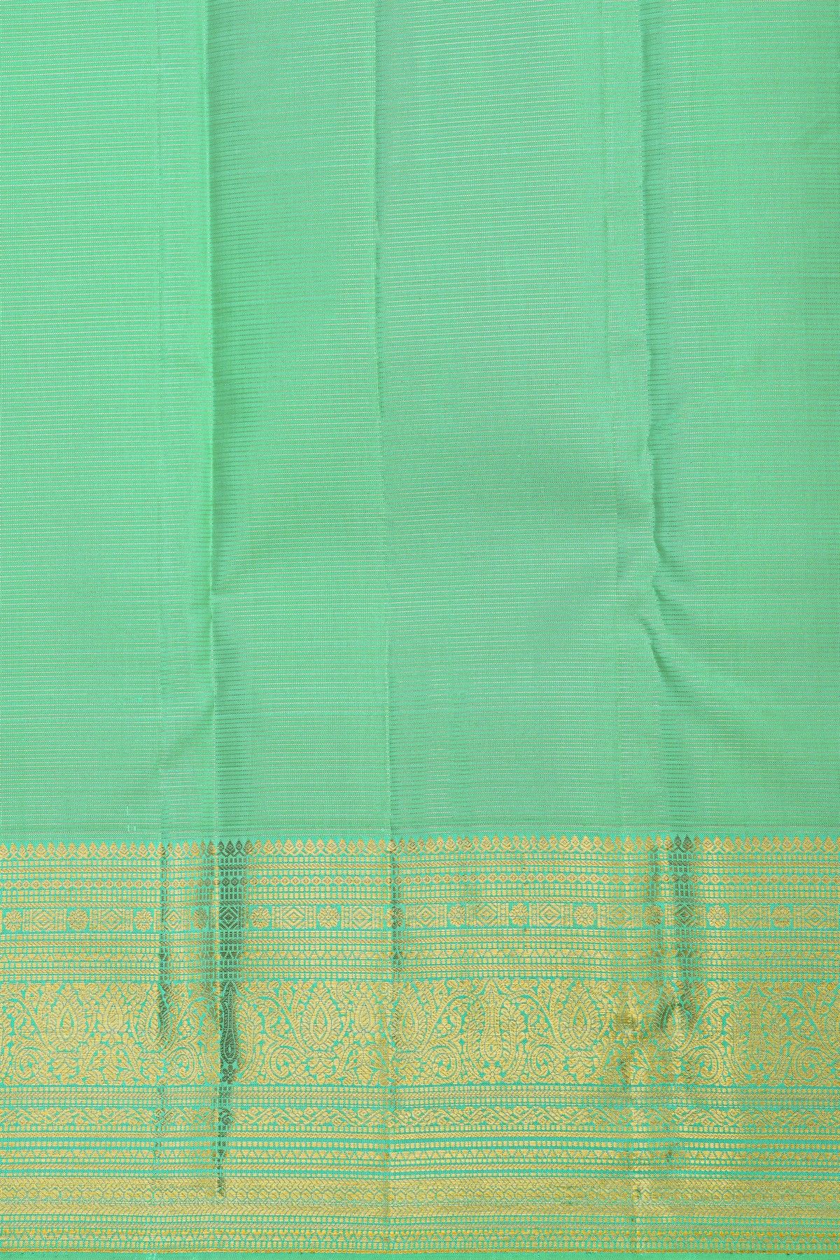 Kancheepuram Silk Sea Green Saree With Florals And Peacock Buttis Body